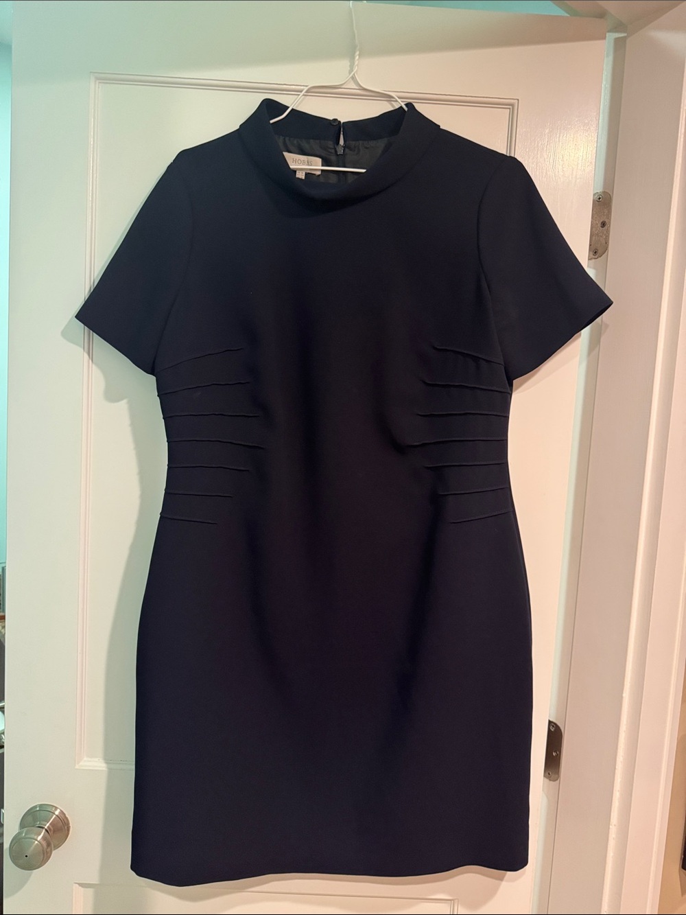 Classic Short-Sleeve Black Mini Dress with Side Pleat Detail
